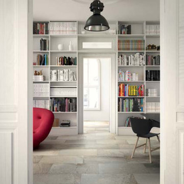 Traditional living room and library with stone look tiles