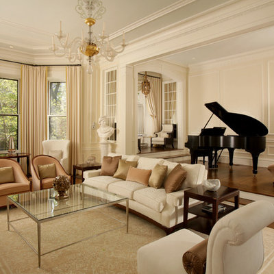 Living room - traditional formal and enclosed medium tone wood floor living room idea in Boston with beige walls