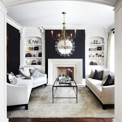 Elegant formal and enclosed dark wood floor living room photo in Dallas with black walls, a standard fireplace and no tv