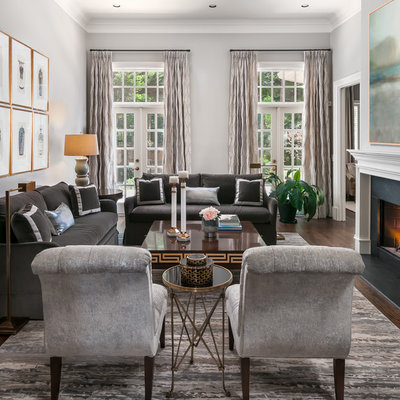 Inspiration for a mid-sized timeless formal dark wood floor living room remodel in Atlanta with gray walls, a standard fireplace and no tv