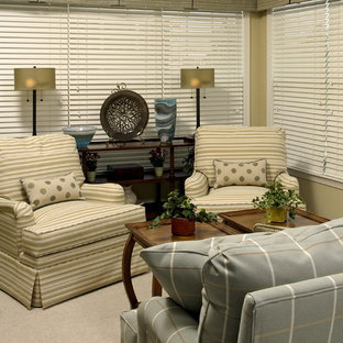 Example of a small classic living room design in DC Metro with beige walls