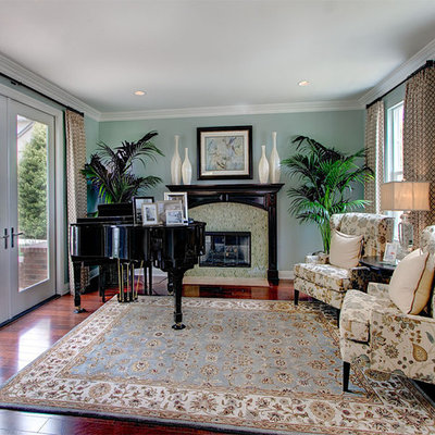 Example of a classic living room design in Other with a tile fireplace