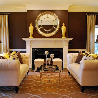 Inspiration for a timeless living room remodel in Atlanta with brown walls and a standard fireplace