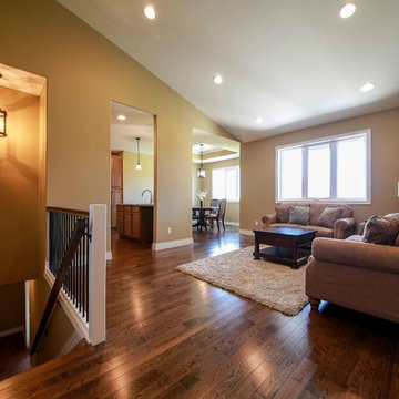 Transitional Interior with beige walls and medium brown floors
