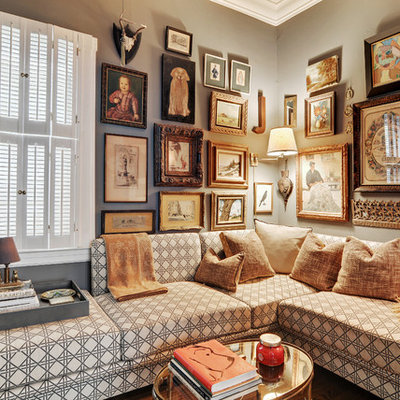Example of a transitional living room design in Chicago with gray walls
