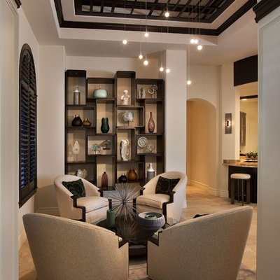 Mid-sized transitional formal and open concept limestone floor living room photo in Miami with no fireplace