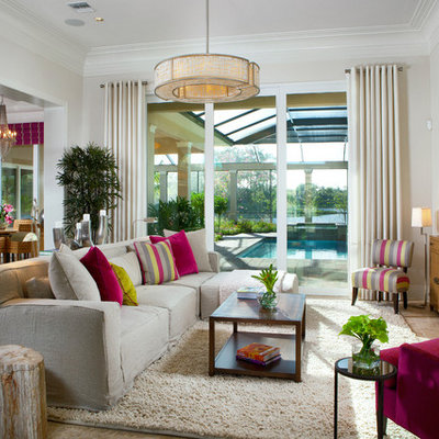 Example of a transitional open concept living room design in Other with beige walls and no tv