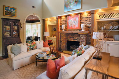 Example of a large transitional open concept living room design in Other with a standard fireplace and a stone fireplace