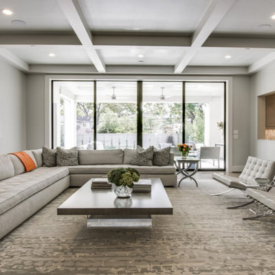 Inspiration for a large contemporary formal and open concept dark wood floor living room remodel in Dallas with gray walls