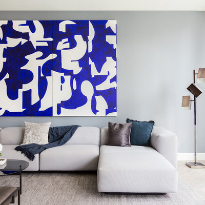 Inspiration for a contemporary formal beige floor living room remodel in New York with gray walls