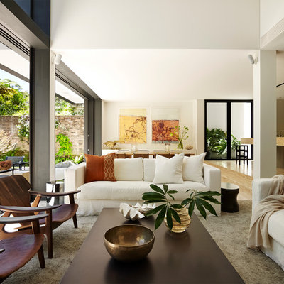 Living room - contemporary formal and open concept living room idea in Sydney with white walls, no fireplace and no tv