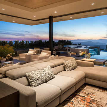 Trousdale Beverly Hills luxury home modern living room that opens sliding glass