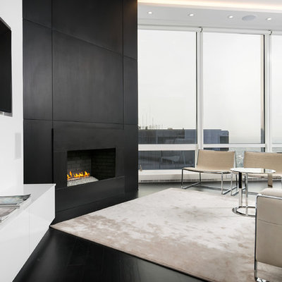 Living room - small contemporary formal and open concept dark wood floor living room idea in Chicago with white walls, a corner fireplace and a wall-mounted tv