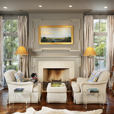 Living room library - mid-sized traditional dark wood floor living room library idea in Houston with gray walls, a standard fireplace and a tile fireplace