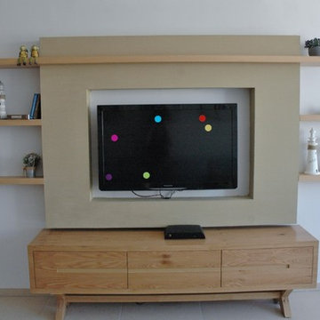 tv wall with floating oak shelves