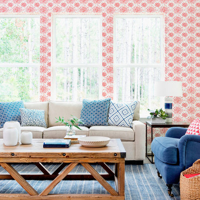 Inspiration for a large tropical open concept dark wood floor and blue floor living room remodel in Jacksonville with multicolored walls