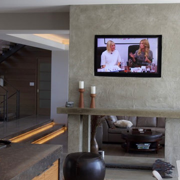 Two sided Fireplace with recessed Flatscreen TV's