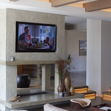 Two sided Fireplace with recessed Flatscreen TV's