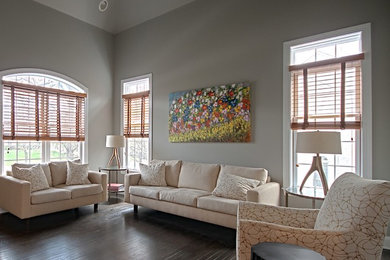 Inspiration for an expansive classic open plan living room in Philadelphia with grey walls and dark hardwood flooring.