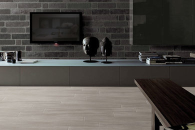 トロントにある低価格の広いコンテンポラリースタイルのおしゃれなLDK (グレーの壁、磁器タイルの床、タイルの暖炉まわり、壁掛け型テレビ) の写真