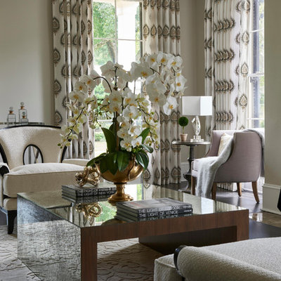 Inspiration for a mid-sized transitional formal and enclosed dark wood floor living room remodel in Orlando with white walls, a standard fireplace, a stone fireplace and no tv