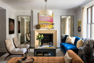 Medium sized classic formal enclosed living room in New York with grey walls, a standard fireplace, dark hardwood flooring, a tiled fireplace surround, no tv and brown floors.