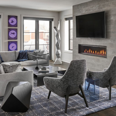 Large trendy open concept dark wood floor and brown floor living room photo in Chicago with gray walls, a tile fireplace, a wall-mounted tv and a ribbon fireplace