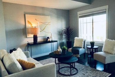 Transitional living room photo in Calgary