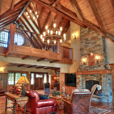 Living room - rustic formal living room idea in Sacramento with a standard fireplace and a stone fireplace
