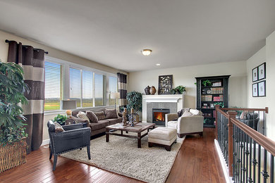 Example of a transitional living room design in Seattle