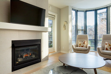 Example of a transitional living room design in Vancouver