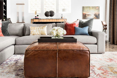 Example of a large transitional open concept brown floor living room design in Portland with white walls, no fireplace and no tv