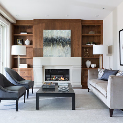 Living room - mid-sized transitional enclosed and formal dark wood floor and brown floor living room idea in Vancouver with beige walls, a concrete fireplace, no tv and a ribbon fireplace