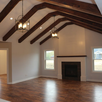 Vaulted Family Room with Reclaimed Wood Beams