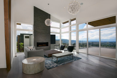 Inspiration for a large contemporary formal and open concept dark wood floor and brown floor living room remodel in Seattle with white walls, a ribbon fireplace, a tile fireplace and no tv