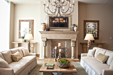 Example of a large trendy formal and open concept dark wood floor and brown floor living room design in Other with beige walls, a standard fireplace, a stone fireplace and no tv