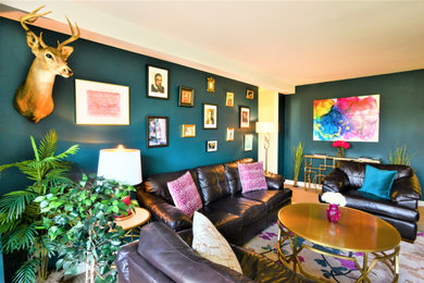 Living room - eclectic carpeted living room idea in Newark with blue walls