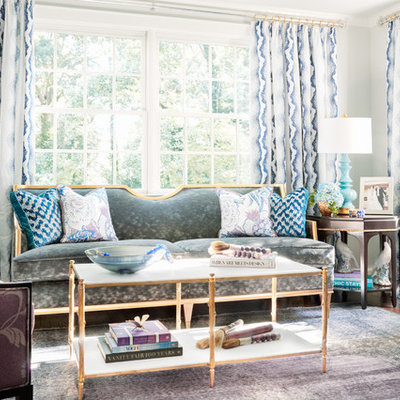 Example of a classic formal living room design in Other with gray walls and no fireplace