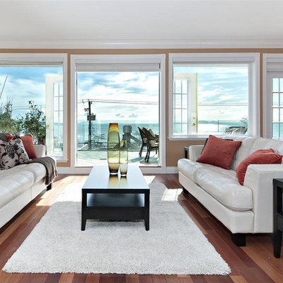 Living room - traditional living room idea in Other with beige walls