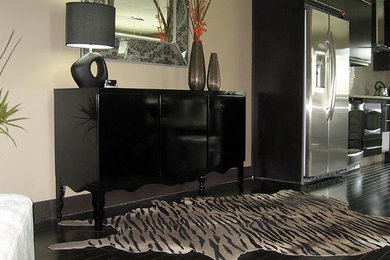 Mid-sized trendy open concept dark wood floor living room photo in Vancouver with beige walls