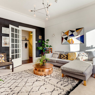 Inspiration for a transitional carpeted and white floor living room remodel in Sussex with white walls, no fireplace and no tv