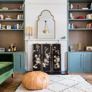 Idéer för att renovera ett mellanstort vintage separat vardagsrum, med ett finrum, beige väggar, mellanmörkt trägolv, en standard öppen spis och en spiselkrans i sten
