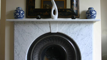 Victorian marble fire surround with arched cast iron grate