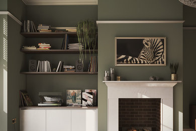 Idée de décoration pour un salon vintage de taille moyenne et fermé avec un mur vert, un sol en bois brun, une cheminée standard, un manteau de cheminée en plâtre, un téléviseur fixé au mur et un sol marron.