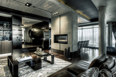 Mittelgroßes, Repräsentatives, Fernseherloses Modernes Wohnzimmer im Loft-Stil mit beiger Wandfarbe, dunklem Holzboden, Tunnelkamin, verputzter Kaminumrandung und braunem Boden in Los Angeles