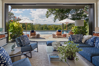 View of the swimming pool with distant mountains beyond.