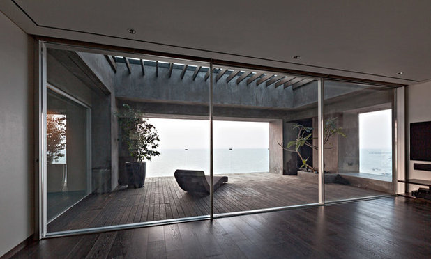 Modern Living Room by Abraham John ARCHITECTS