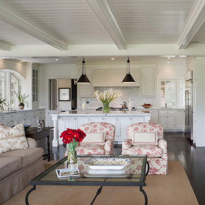 Example of a large classic open concept and formal dark wood floor living room design in Philadelphia with beige walls, a standard fireplace, a stone fireplace and no tv