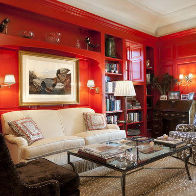 Mid-sized elegant open concept carpeted living room library photo in Philadelphia with red walls, a standard fireplace, no tv and a metal fireplace