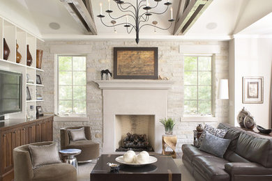 Inspiration for a rustic dark wood floor living room remodel in Chicago with beige walls and a standard fireplace